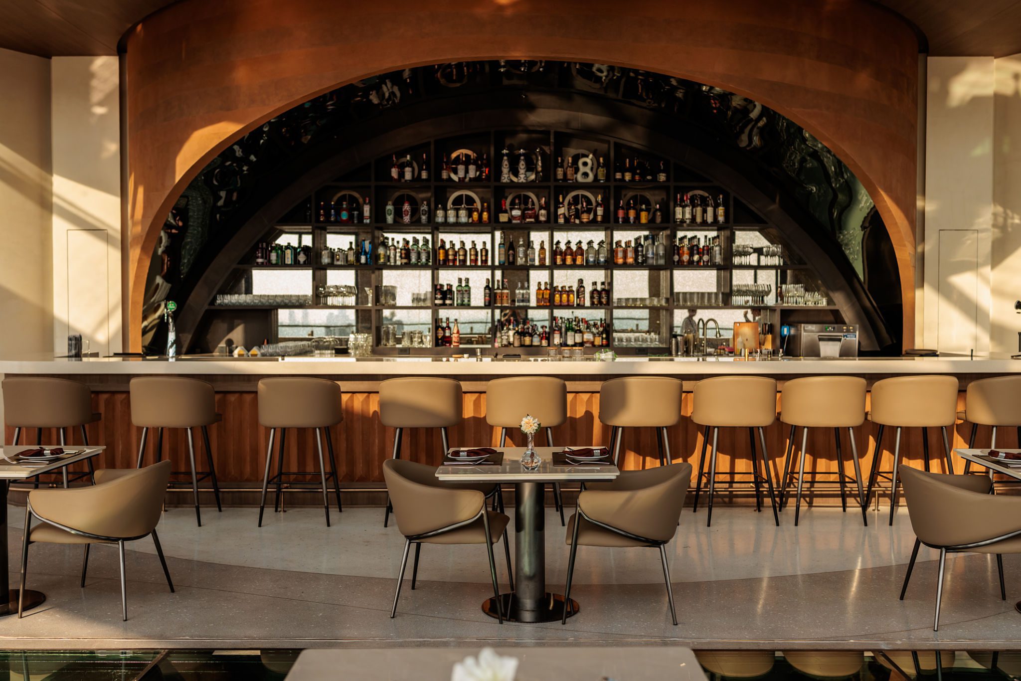 Contemporary bar setup with bottles displayed