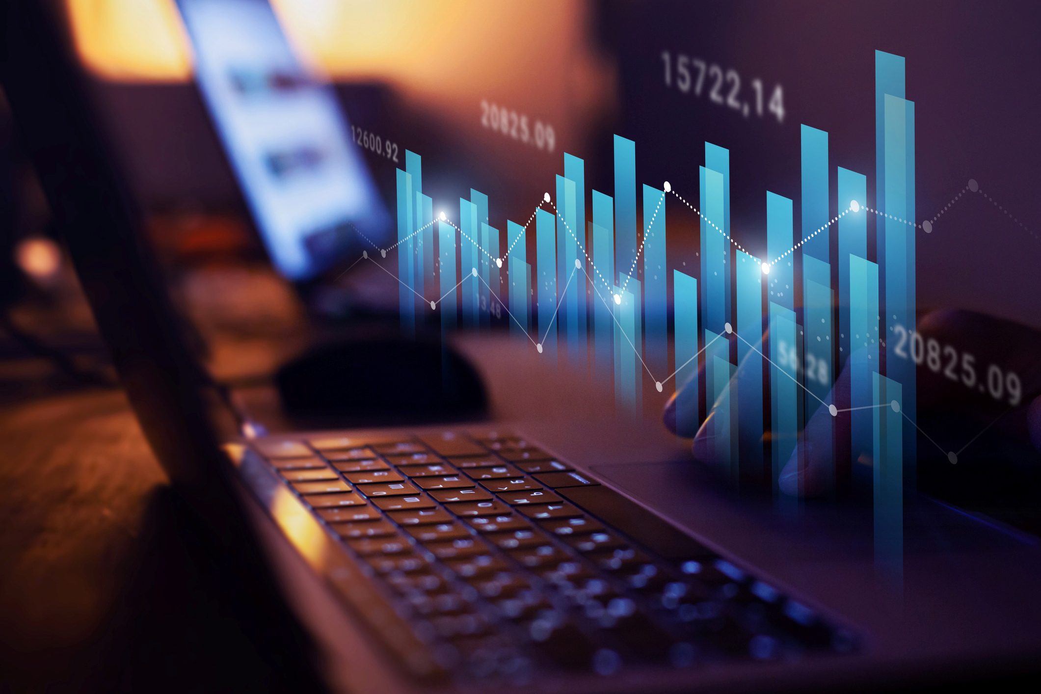Digital graphs displayed on a laptop